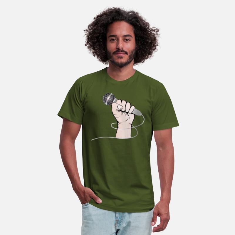 A hand of a singer holds a singing microphone